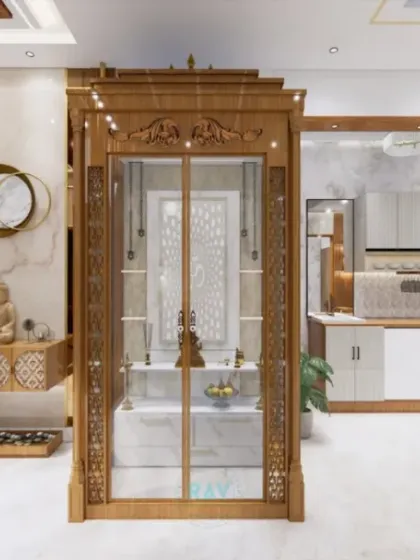 This render shows a large, traditionally carved wooden pooja unit placed elegantly in the living area, complemented by a modern foyer unit with a Buddha statue.