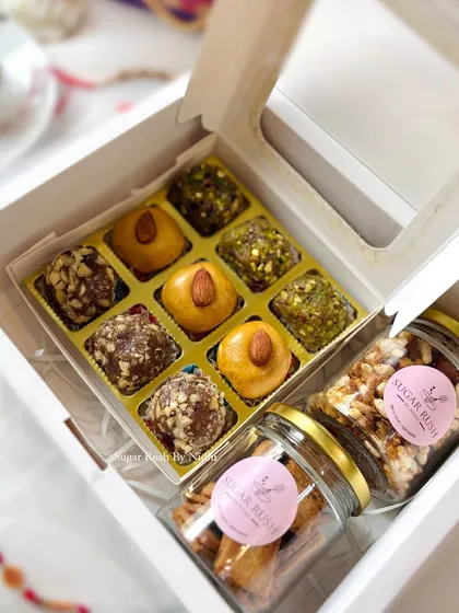 'The Rakhi Delight Box' combines the best of both worlds: a box of Indian fusion sweets and two jars of my savory snacks, Masala Granola and Brown Butter Shakarpara.