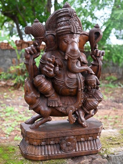 Another view of the 32.5-inch Lambodara Ganapathy, showing the details of the mooshak vahana.