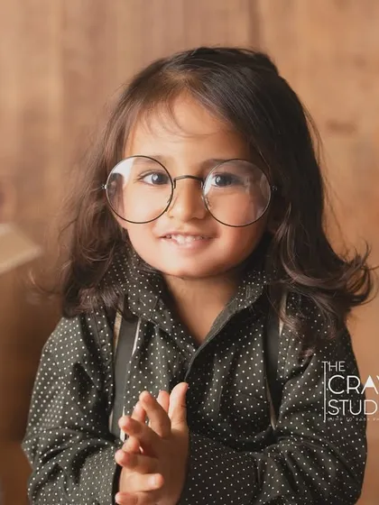 The cutest little professor. Wearing oversized glasses, this toddler looks ready to share his wisdom.