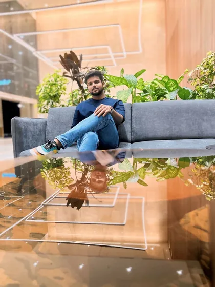 A moment of reflection in the office lobby. The modern, organized environment reflects my approach to financial services: structured, clear, and focused on today's challenges.