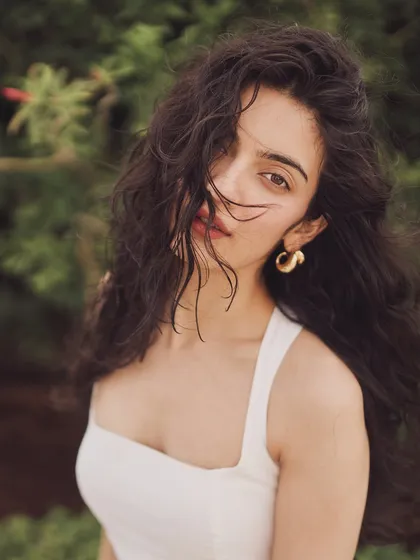 The beautiful Pratibha Ranta in a simple white sundress. This look is all about natural beauty and effortless style, perfect for a summer event.