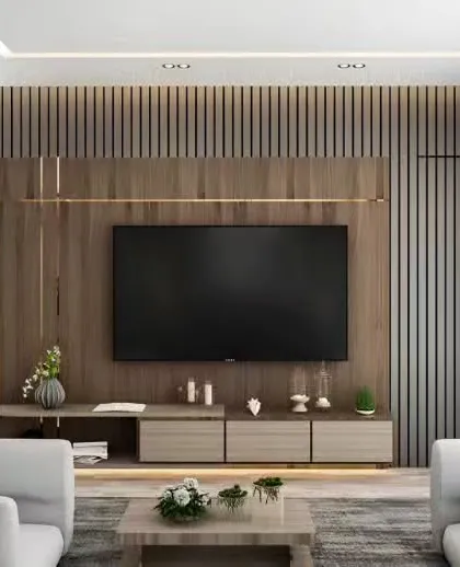 This expansive entertainment wall combines a sleek, low-profile console with a textured backdrop of vertical wooden slats. The design creates a sense of width and luxury, perfectly framing the television in a contemporary open-plan living room.