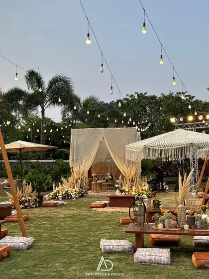 This is my vision of a perfect bohemian sundowner. I used a mix of low seating with floor cushions, macrame canopies, pampas grass, and warm string lights to create a relaxed, earthy, and incredibly chic vibe.