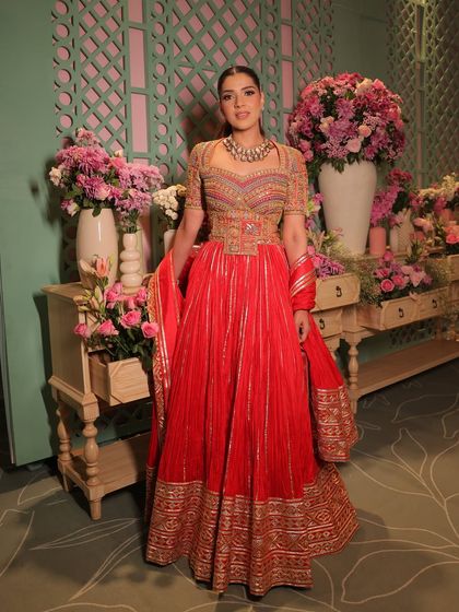 The full look, showcasing the beautiful flare of the anarkali. A perfect blend of traditional craftsmanship and modern styling.