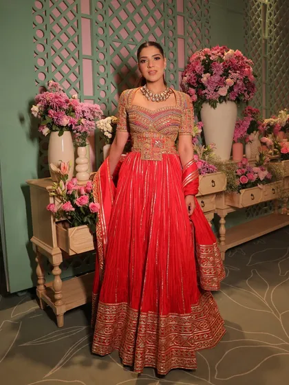 The full look, showcasing the beautiful flare of the anarkali. A perfect blend of traditional craftsmanship and modern styling.