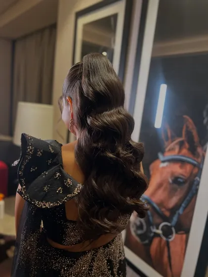 The complete look, a chic and modern hairstyle that is perfect for dancing the night away.