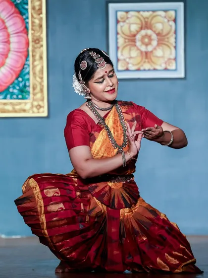 Abhinaya, or the art of expression, is the soul of Bharatanatyam. In this moment, I am portraying a specific emotion from a story, using hand gestures (mudras) and facial expressions. In my classes, we focus deeply on these storytelling techniques to make the dance meaningful.
