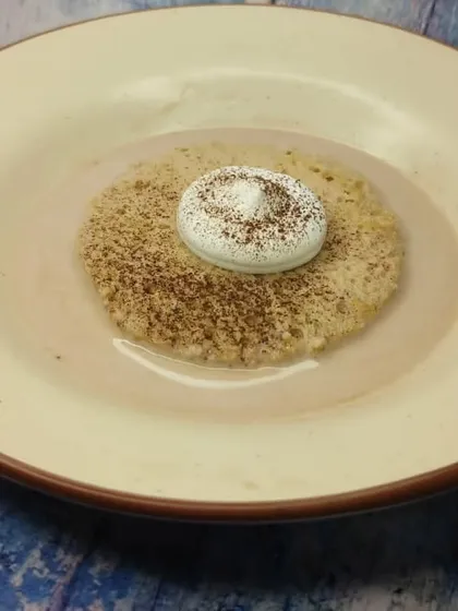 A coffee-flavored Tres Leches cake, dusted with cocoa powder. This is another example of how we teach students to adapt and create new flavor profiles.