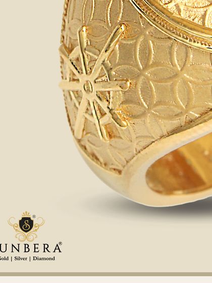 A macro shot of a gold ring, highlighting the intricate texture and star-like engraving. This image emphasizes the precision and detail of our manufacturing process.