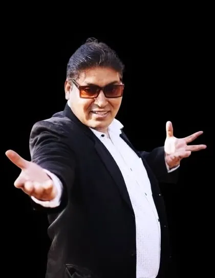 A confident pose, ready for the show. I bring professionalism and two decades of experience to every single performance.