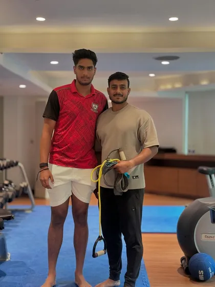 In the gym with one of the players. Even during the tournament, strength work is crucial for maintenance and injury prevention.