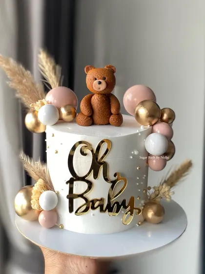 Celebrating a new arrival with this adorable "Oh Baby" teddy bear cake. It’s perfect for baby showers, with cute details like the balloon bunch and a sweet little bear topper to welcome the little one.