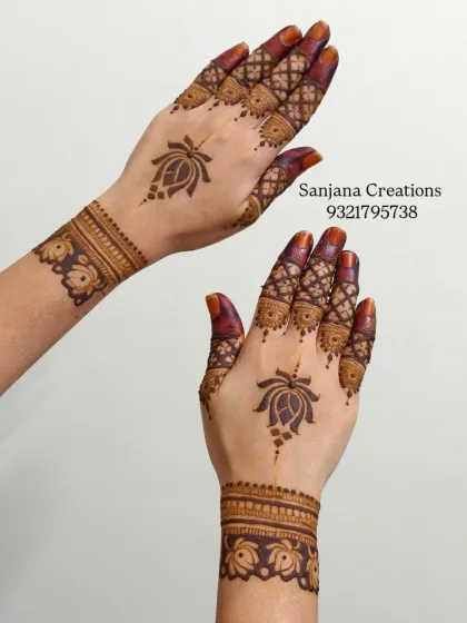 Both hands showcasing the beautiful symmetry and rich stain of this elegant design.
