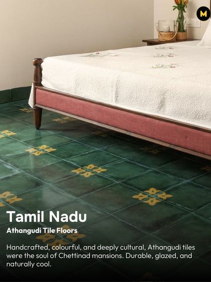 The soul of Chettinad mansions can be found in their Athangudi tile floors. This image shows a beautiful green tile with a yellow floral motif, handcrafted to be naturally cool and durable. It’s a piece of Tamil Nadu's culture you can bring into your bedroom.