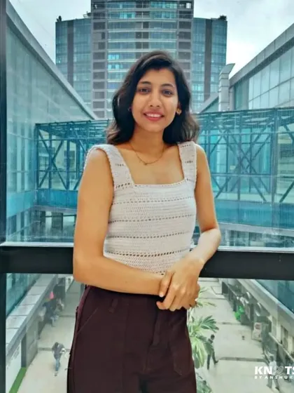 A happy client wearing her custom reversible top. This side features a classic square neckline.
