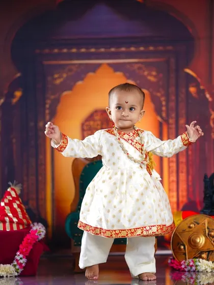 Standing tall and proud. This action shot shows our little Shivaji ready for anything, capturing a dynamic and spirited moment.