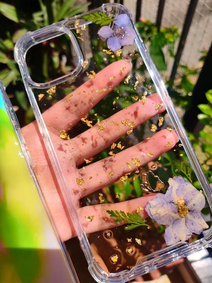 A closer look at some of my floral resin phone cases. I use a variety of real, carefully pressed flowers to create these miniature gardens you can carry with you.