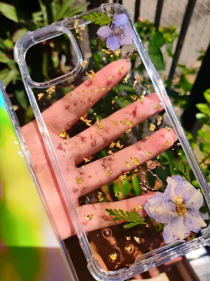 A closer look at some of my floral resin phone cases. I use a variety of real, carefully pressed flowers to create these miniature gardens you can carry with you.