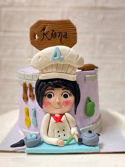 Another view of our detailed master chef cake, complete with tiny kitchen utensils.