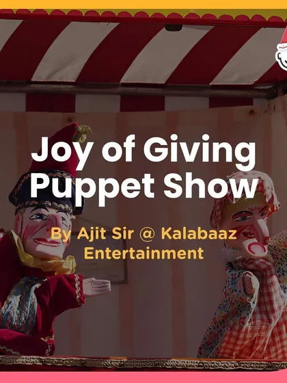 The "Joy of Giving" puppet show at the OMAXE Christmas carnival, teaching a valuable lesson through entertainment.