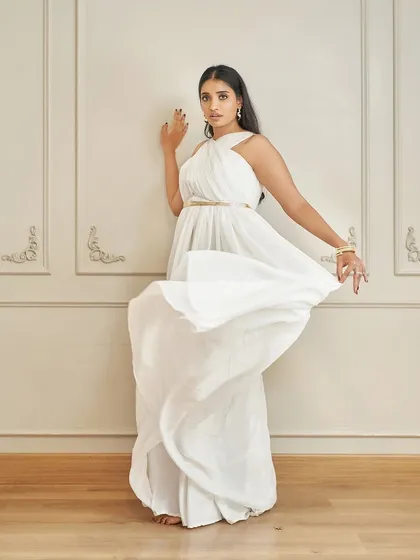 The 'Paul' gown in motion. The lightweight georgette fabric of the skirt is perfect for creating shots with a sense of movement and grace.
