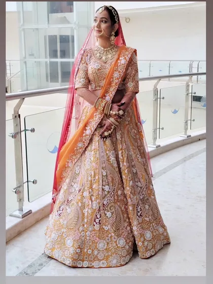 A beautiful Marwadi bride ready for her big day. I draped her embroidered lehenga with a traditional side dupatta, ensuring the intricate work on her outfit was fully visible.