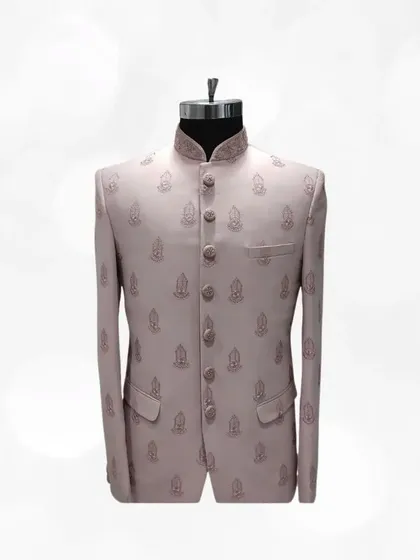 A subtle yet elegant option, this light pink Jodhpuri suit features delicate buti embroidery all over, offering a classic and understated look.