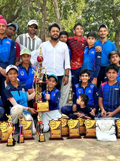 A moment of pride with my team and our collection of trophies. Success in tournaments is a testament to the dedication and team spirit we foster at the academy.