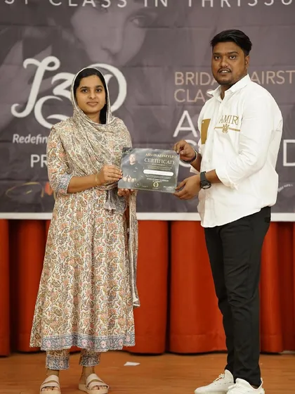 Handing out another certificate at my workshop. It's always a pleasure to teach passionate students.
