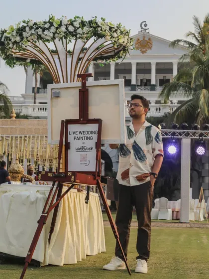 Our live painting station set up on the lawns of the palace, ready to capture the magic.
