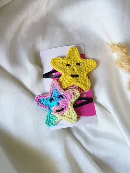 Let your little one shine with these happy star clips! I've added little embroidered faces to make them extra cheerful.