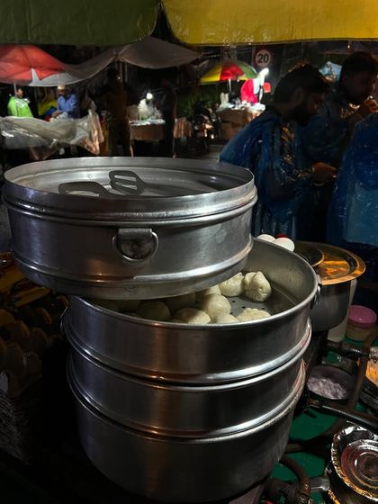 Hot momos on a rainy night in the mountains. My travel content always includes local food experiences that make a trip memorable.