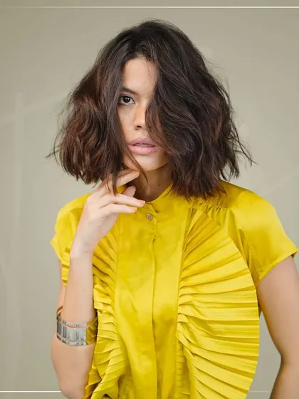 A close-up of the textured bob, showing how the layers fall to create a soft yet defined look. This is a versatile haircut that looks great from every angle and is easy to manage.