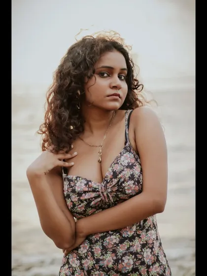 A great portrait is all about expression. For this shot, I focused on a bold and direct gaze, using the natural light of the sunset to highlight the model's features and create a captivating mood.