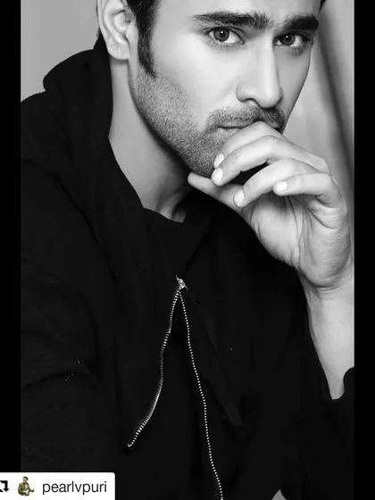 A classic black and white portrait of actor Pearl V Puri. This type of intense, expressive headshot is essential for an actor's portfolio, highlighting their screen presence without distraction.