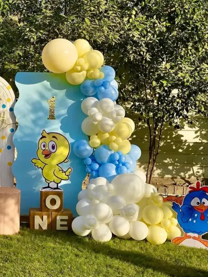 Another angle of the duckling theme, showing the 'ONE' blocks and the cute character cutouts that bring the party to life.