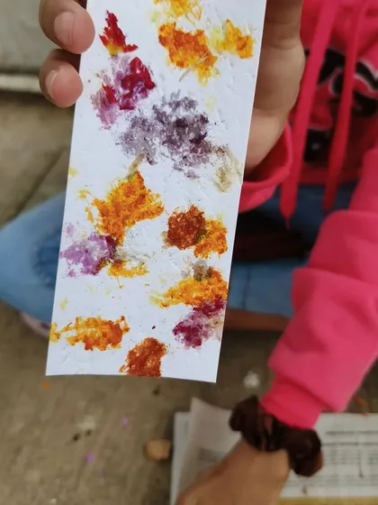 Discovering colors from nature. In our botanical art workshop, children learn to extract pigments from flowers and leaves to create beautiful, abstract bookmarks. It's a magical and eco-friendly process.