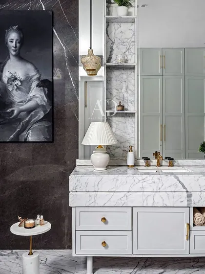 Every detail in this space was thoughtfully curated to create a harmonious blend of functionality and aesthetics. The design incorporates the client's love for monotones, with shades of grey and white creating a chic and stylish bathroom.