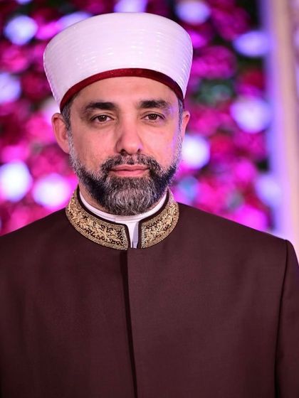 Carrying the legacy of 18 generations with grace. Shaykh Hashim al-Gaylani embodies heritage in a custom-made Dawood Khan Overcoat Sherwani with an embroidered collar.