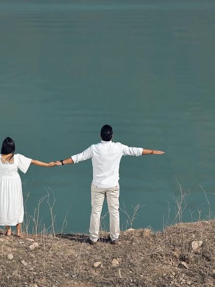A "Titanic" inspired pose on the edge of a lake, showing a sense of freedom and togetherness.