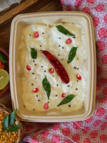 Curd rice is the ultimate comfort food, especially for warm days. Mine is tempered with mustard seeds, curry leaves, and red chili, then garnished with pomegranate for a refreshing finish.