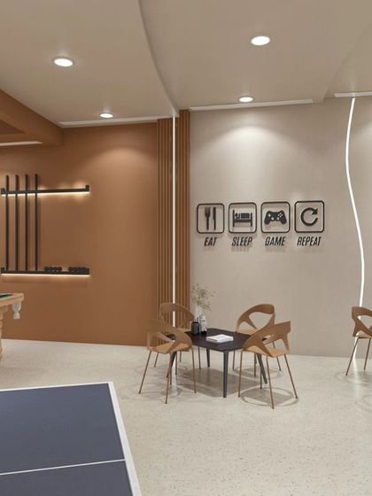 This club features a modern and minimalist design with flowing curves. We used a neutral color palette, terrazzo flooring, and unique lighting to create a chic and dynamic environment for recreation and socializing, including a dedicated game zone.