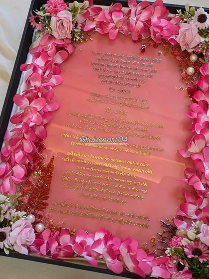 A full view of the pink resin wedding invitation in its presentation box. This is a gift in itself and sets a beautiful tone for the wedding.