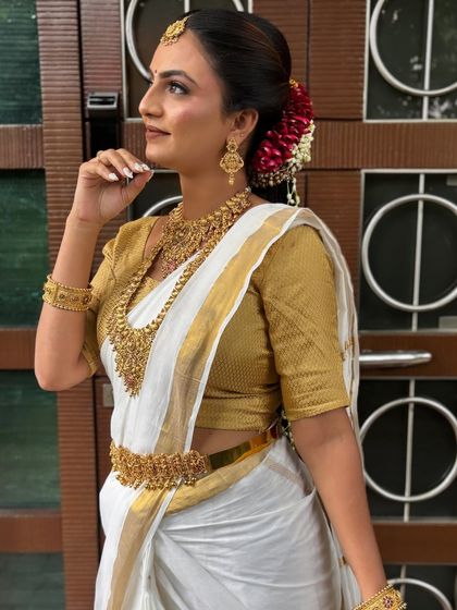 My students learn to experiment while respecting tradition. This classic South Indian look is timeless and beautiful.