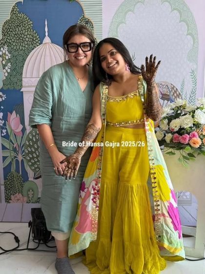 A cherished moment with my bride. Standing together after her mehendi is complete, her smile is the ultimate reward for the hours of patient artistry.