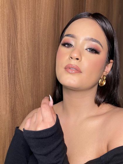 Another angle of this flawless dewy glam look. The focus is on healthy, glowing skin and beautifully defined features.