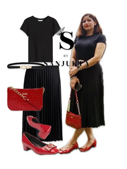 An all-black pleated skirt look is incredibly versatile. For this outfit, I've added a vibrant red bag and matching block heels to create a striking contrast that’s perfect for an evening out or a special event.