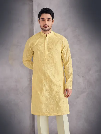 Simplicity and elegance in our pastel yellow kurta. The clean lines and soft color make it a versatile and timeless addition to any man's collection.