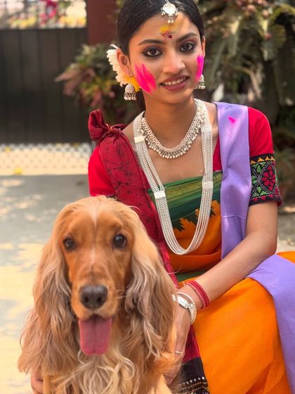 Posto making friends with a beautifully dressed lady during the Basanta Utsav celebrations in Santiniketan.